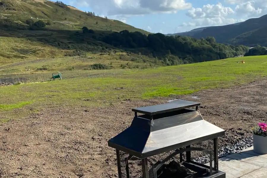 Outdoor patio and firepit at Fernhill Valley Farm